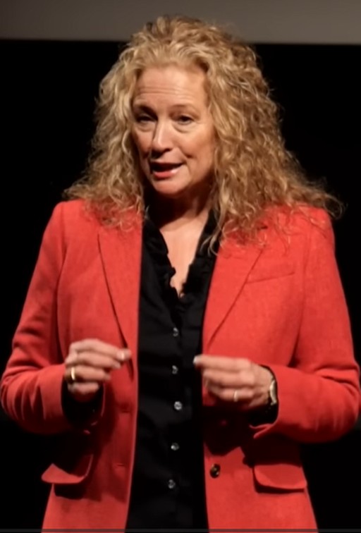 Dr Robyn McKay speaking on stage